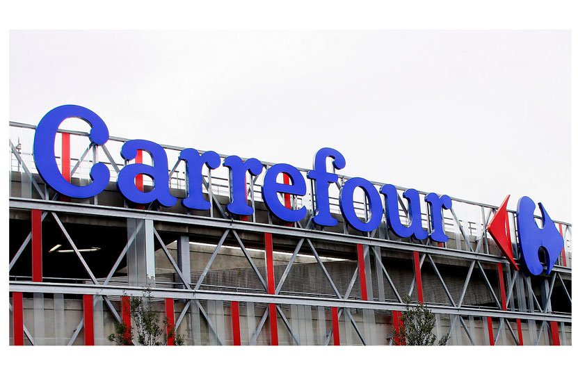 El grupo canadiense Couche-Tard negocia la compra de Carrefour